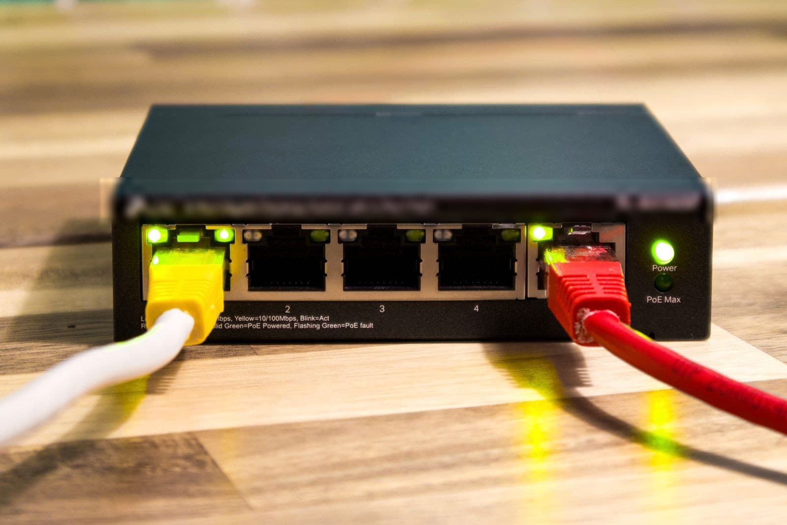 A network switch with ethernet cables plugged in